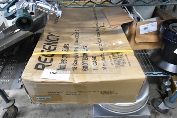 Boxed Regency 600TB3036G 30"x36" stainless steel work table with 4" backsplash, galvanized undershelf. Contains visible dents.