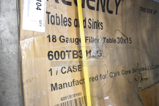 Alt text: Regency 600TB3036G 30"x36" stainless steel work table packaging, showing model and specifications.