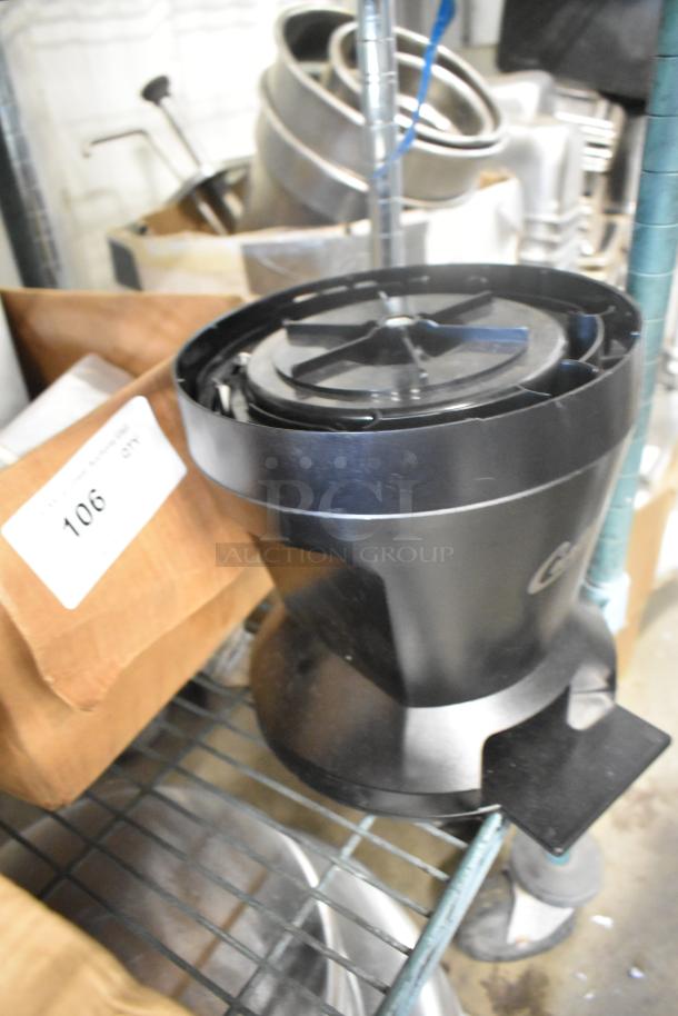 Curtis black poly countertop stand with circular base and top, showing a label "106 qty" in the background.