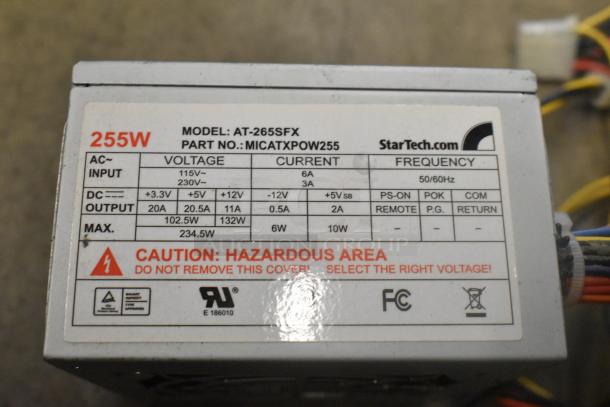 StarTech AT-265SFX 255W power supply, model MICATXPOW255, detailed voltage and current specs, caution warning visible.