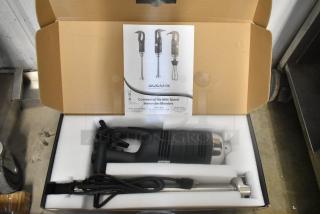 Brand new AvaMix 21" immersion blender, 120 volts, 1 phase, with visible user manual and packaging. Scratch and dent condition.