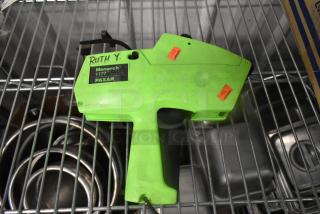 Lot of 15 price guns, including Monarch 1177 model. Bright green, slight wear, labeled "Ruth Y." Essential for pricing tasks.