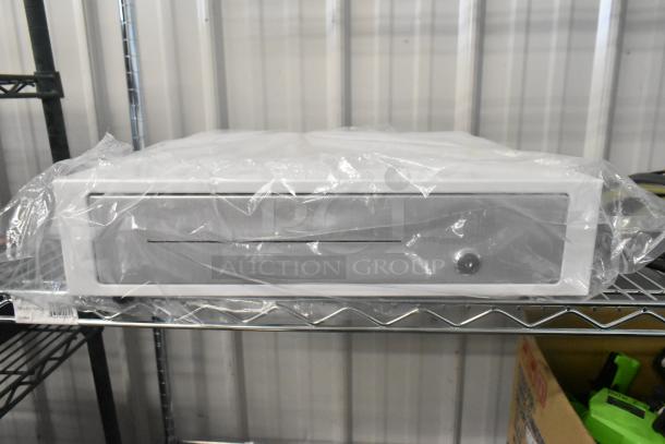 Brand new Clover D100 white metal cash drawer, scratch and dent condition, wrapped in protective plastic, on metal shelf.