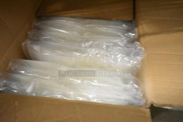 Box of brand new stand-up pouches in transparent packaging, neatly stacked in a cardboard box.