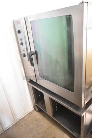 Rational stainless steel commercial natural gas convection combi oven on equipment stand, visible control panel, excellent condition.