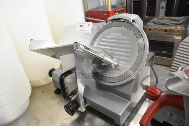 Backyard Pro 554SL110E stainless steel commercial meat slicer with blade sharpener, 115 volts, excellent condition.