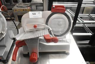 2023 Berkel B9-SLC stainless steel countertop meat slicer with blade sharpener, 115V, 1 phase; includes auction label.
