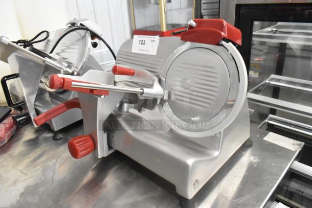 2023 Berkel B9-SLC stainless steel countertop meat slicer with blade sharpener, 115 volts, 1 phase, excellent condition.