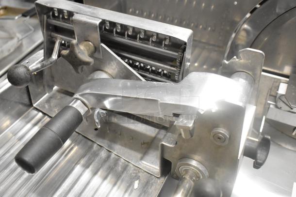 Bizerba A330 stainless steel meat slicer stacker, commercial countertop model, 120 volts, 1 phase, close-up of controls and blades.