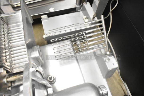 Bizerba A330 Stainless Steel Meat Slicer Stacker, commercial-grade, 120V, 1 Phase, in good condition with visible slicer and stacking components.
