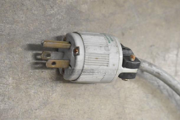 Electrical plug close-up for Bizerba A330 commercial meat slicer. 120 volts, 1 phase, hospital grade labeling visible.