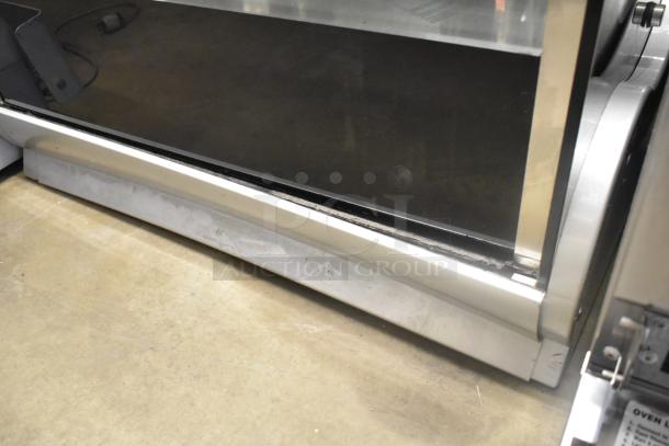 Stainless steel commercial countertop display case merchandiser with glass front, showcasing durable construction.