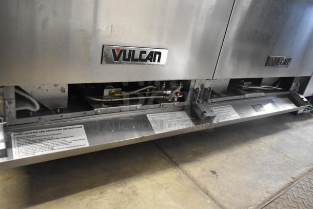 Vulcan 60SS-6B24GTN stainless steel 6-burner range with flat top griddle, 2 ovens, over-shelf, and casters; natural gas powered.