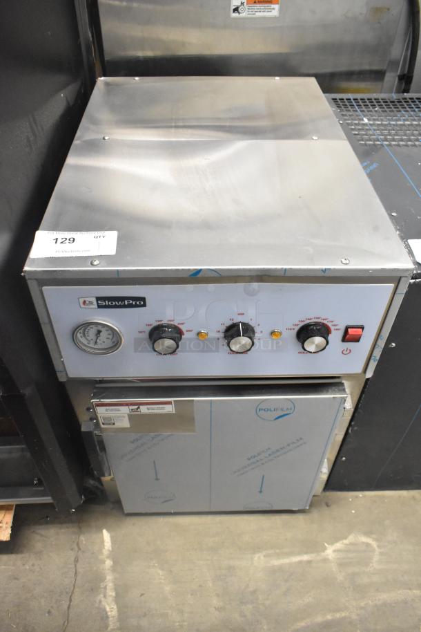 BRAND NEW SCRATCH AND DENT 2024 CPG SlowPro CHCT1A Countertop Cook and Hold Oven, 120V, 1 Phase; tags show model and voltage details.