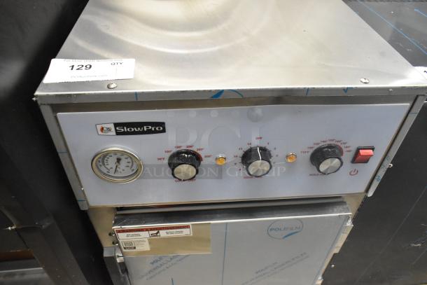 Brand new 2024 Cooking Performance Group SlowPro CHCT1A countertop cook and hold oven, 120V, 1 phase, gauges and control knobs visible.