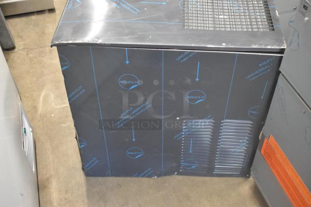 Cornelius WCC700-A 14.5" air-cooled ice maker, 616 lb capacity, brand new with minor dents, protective film visible.