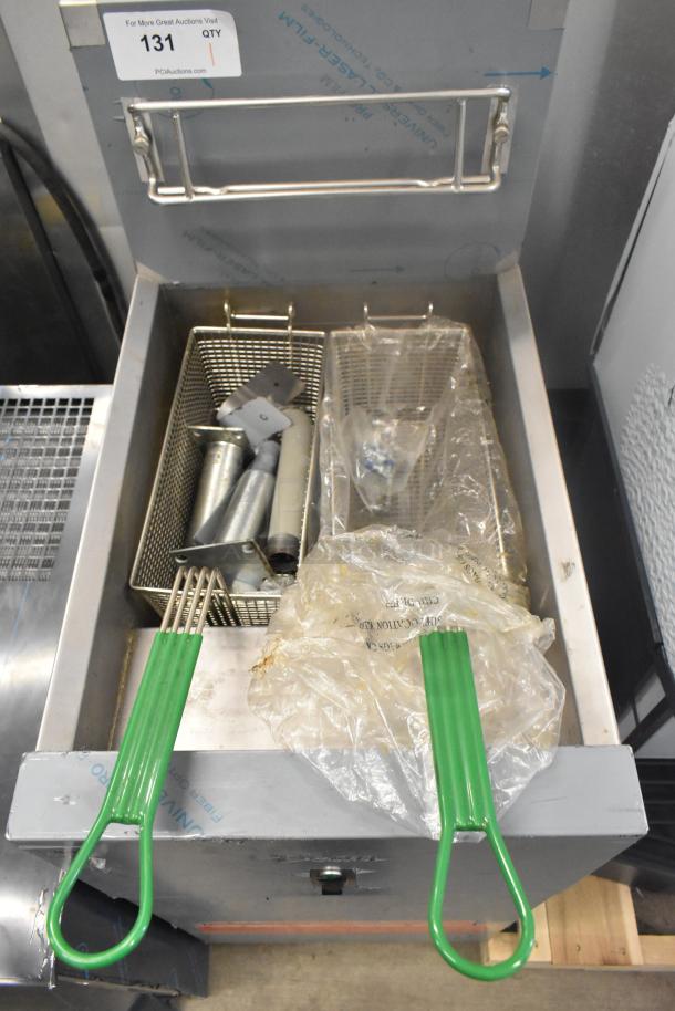 BRAND NEW Frymaster SR114ESD stainless steel electric fryer with 2 metal fry baskets. 240V, 3-phase, slight cosmetic damage.