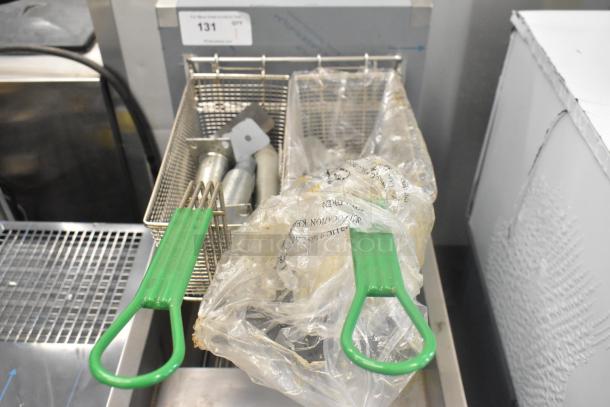 BRAND NEW Scratch and Dent Frymaster SR114ESD stainless steel fryer with 2 green-handled metal baskets. 240V, 3 Phase.