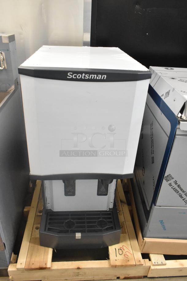 Scotsman HID312A-1A Meridian stainless steel ice machine and water dispenser, 12 lb. bin, 115V, new condition with minor dents.
