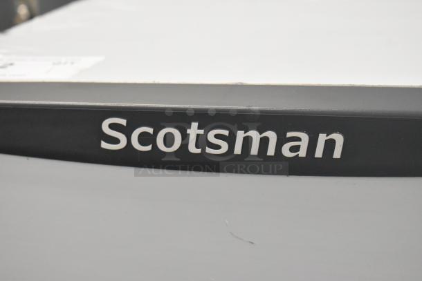 2024 Scotsman HID312A-1A Meridian stainless steel countertop ice machine, brand label visible. New, scratch and dent.