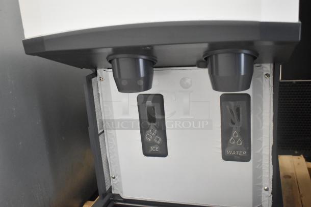 BRAND NEW 2024 Scotsman HID312A-1A Meridian ice machine and water dispenser. Stainless steel, countertop design, 12 lb. bin, slight cosmetic scratch.