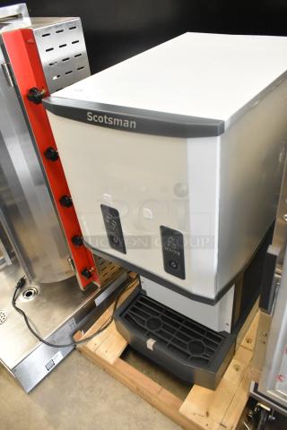 Brand new 2024 Scotsman HID312AB-1A Meridian stainless steel ice machine and water dispenser, 12 lb. bin, push button, scratch and dent.