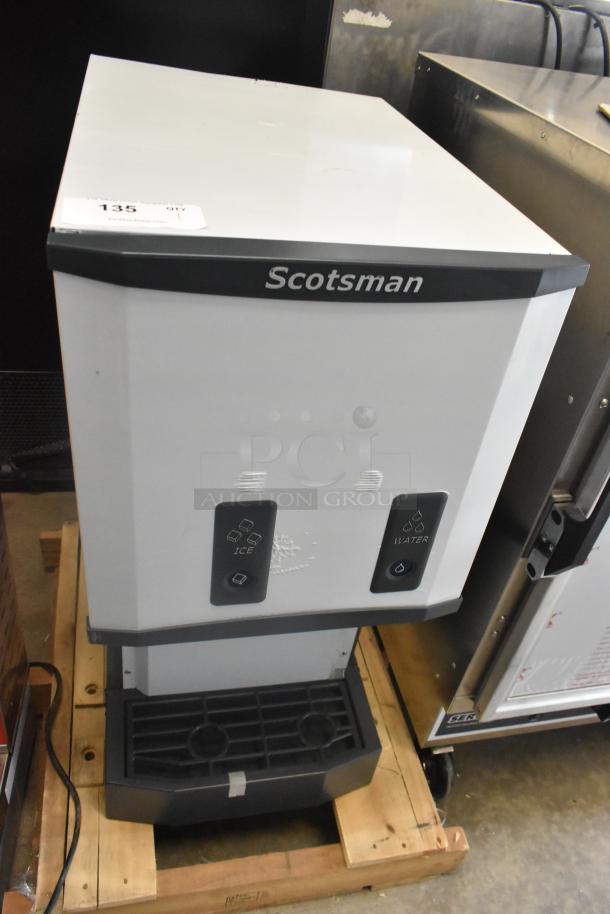 Brand new Scotsman HID312AB-1A stainless steel countertop ice machine and water dispenser, push button, 12 lb bin.