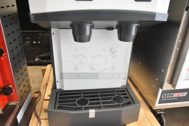 BRAND NEW SCRATCH AND DENT Scotsman HID312AB-1A ice machine and water dispenser, stainless steel, push button, 12 lb. bin storage.