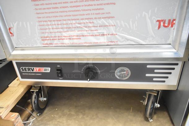 BRAND NEW 2024 ServIt 423CH2UFNCF full-size insulated holding cabinet with a clear door, 120V, 1 phase. Scratch and dent.