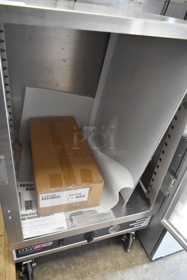 Brand new ServIt 423CH2UFNCF full-size insulated holding cabinet, clear door, 120V, 1 phase, includes manuals and packaging.
