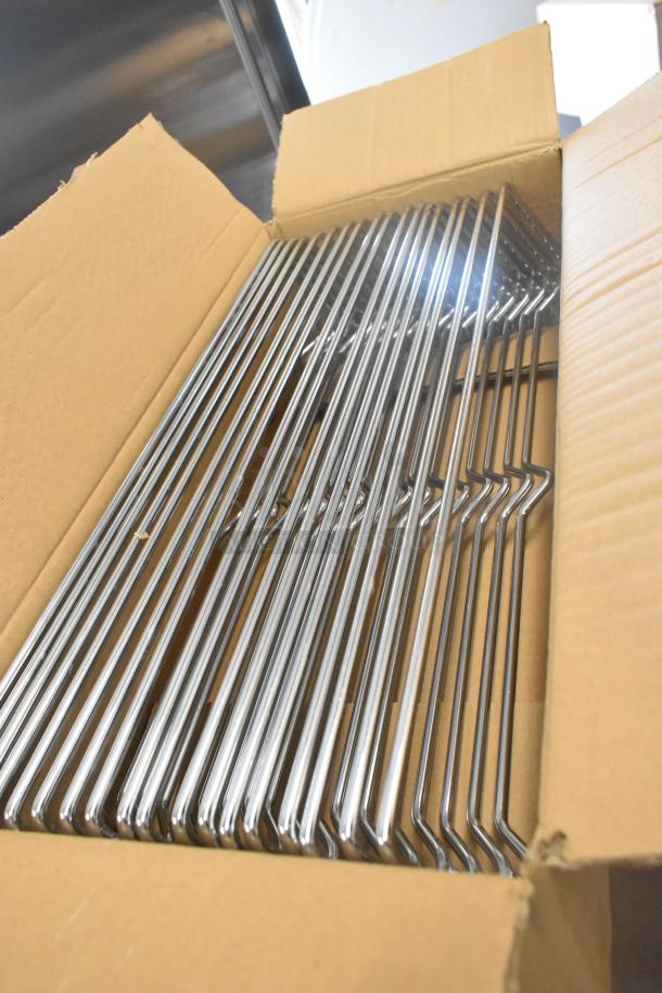 Box of metal rails for ServIt 423CH2UFNCF holding cabinet. New condition, seen inside an open cardboard box.