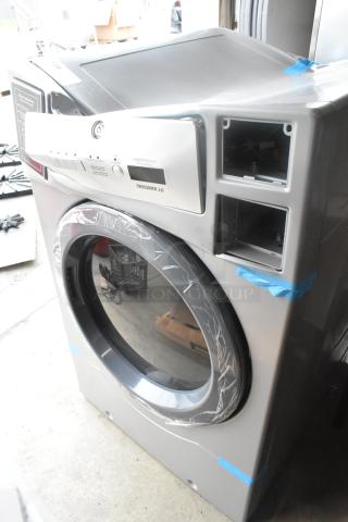 Crossover 2.0 DLHF0817EC2 metal front load dryer, 120-208/240V, 1 phase. New condition with protective wrap.