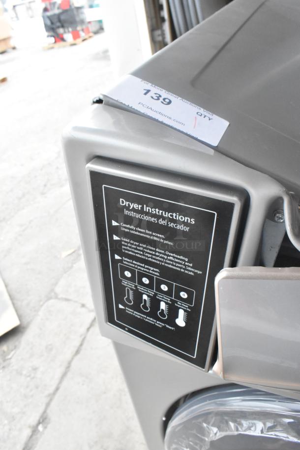 Crossover 2.0 DLHF0817EC2 metal front load dryer with drying instructions label, 120-208/240V, 1 phase, good condition.
