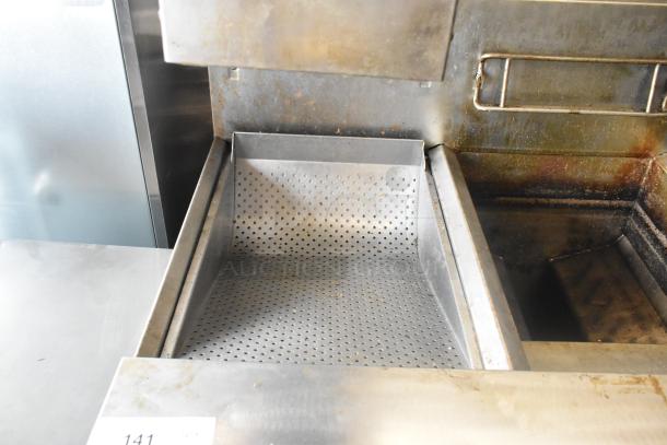 Frymaster FMPH255CSC stainless steel commercial deep fat fryer, two bays, dumping station, natural gas, 80,000 BTU, on casters.