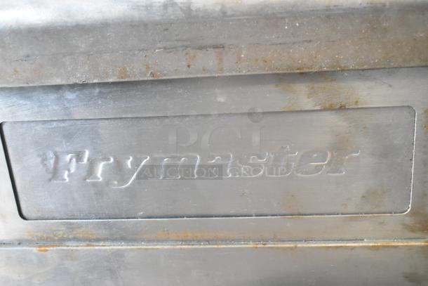 Frymaster FMPH255CSC stainless steel commercial fryer, natural gas, 2-bay, with dumping station, on casters, 80,000 BTU.