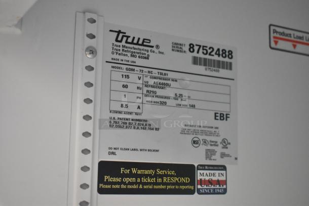 Label for True GDM-72-HC cooler showing model, volts, phase, refrigerant info, and "Made in USA" mark. Suitable for outdoor use.