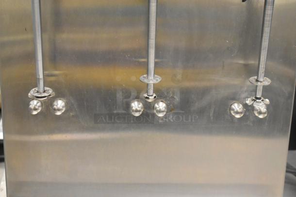 Hamilton Beach 950 Stainless Steel 3 Head Drink Machine, 120V, features mixing spindles, good condition.