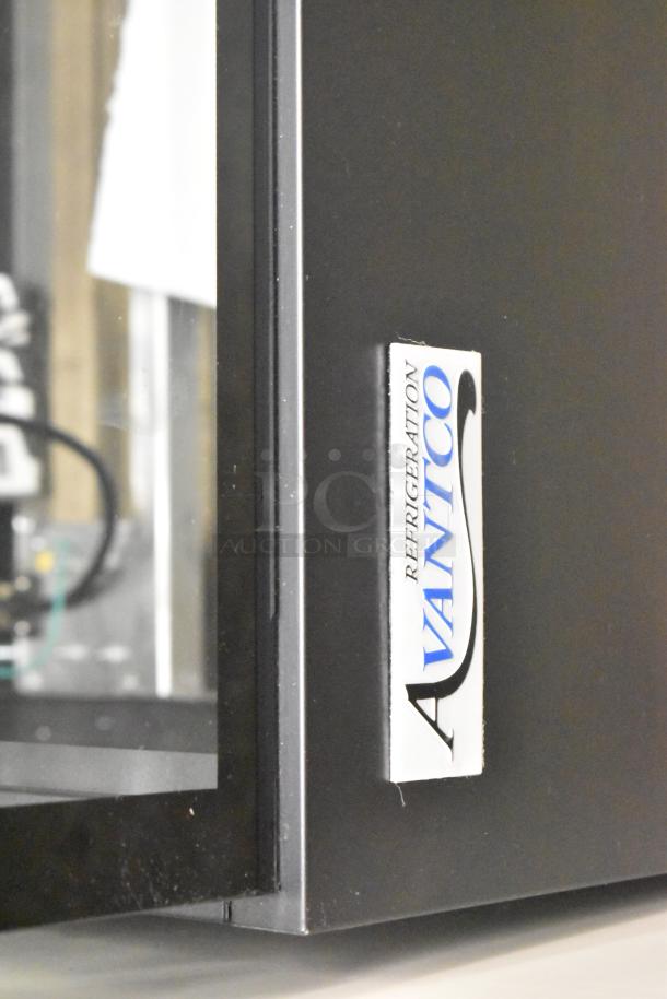 Brand new Avantco 193BCFD72B black metal bakery display case, scratch and dent, 70 7/8", LED lighting, 120V, label visible.