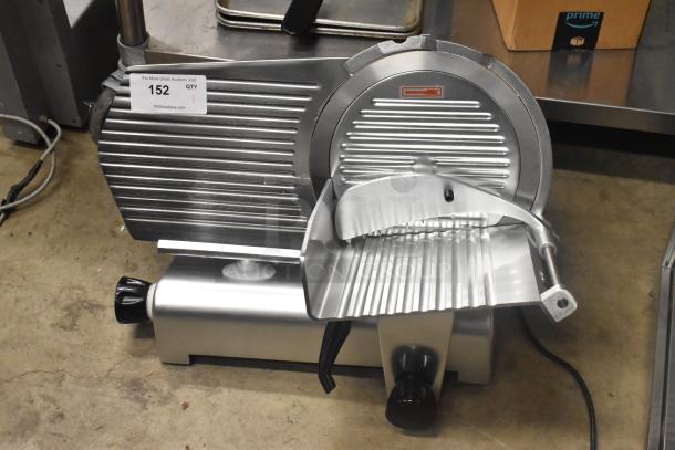 Brand new Avantco 177SL312 12" manual meat slicer with blade sharpener, 1/3 hp, 115 volts. Scratch and dent condition.