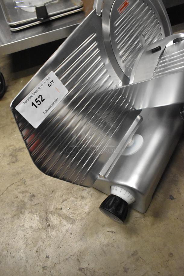 Avantco 177SL312 12" manual gravity feed meat slicer, brand new with scratch and dent. Includes blade sharpener. 1/3 hp, 115V.