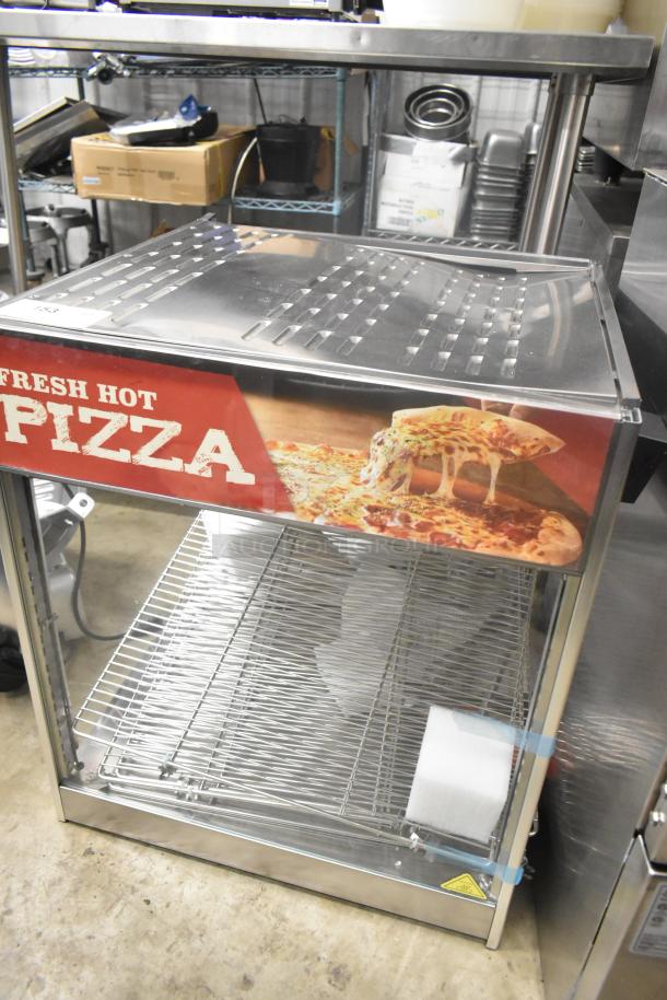Brand new ServIt 423PDW18D2S display warmer with 4 shelves, minor scratches, pizza graphic, 120V, 1 phase.