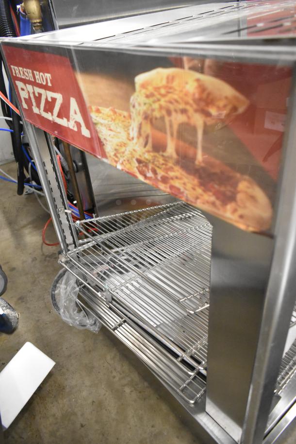Brand new ServIt 423PDW18D2S 18" display warmer with four wire shelves, "Fresh Hot Pizza" sign, minor scratches.