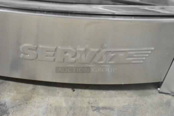 Brand new ServIt 423PDW12D1S 12" countertop display warmer, 4 shelves, 120V, 1 phase, logo detail visible.
