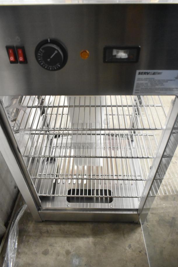 Brand new ServIt 423PDW12D1S 12" countertop display warmer, 4 shelves, 120V, slight scratches, full-service model.