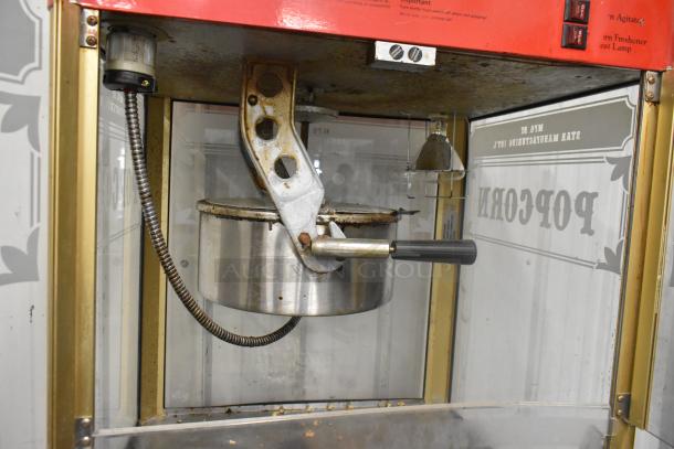 Carnival King G14-A Popcorn Machine, commercial-grade, metal, visible wear, branded controls, 120V, single-phase.