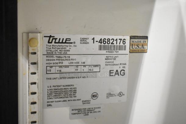 True TSSU-72-16 stainless steel sandwich salad prep table identification label, showing model, voltage, and refrigerant details.
