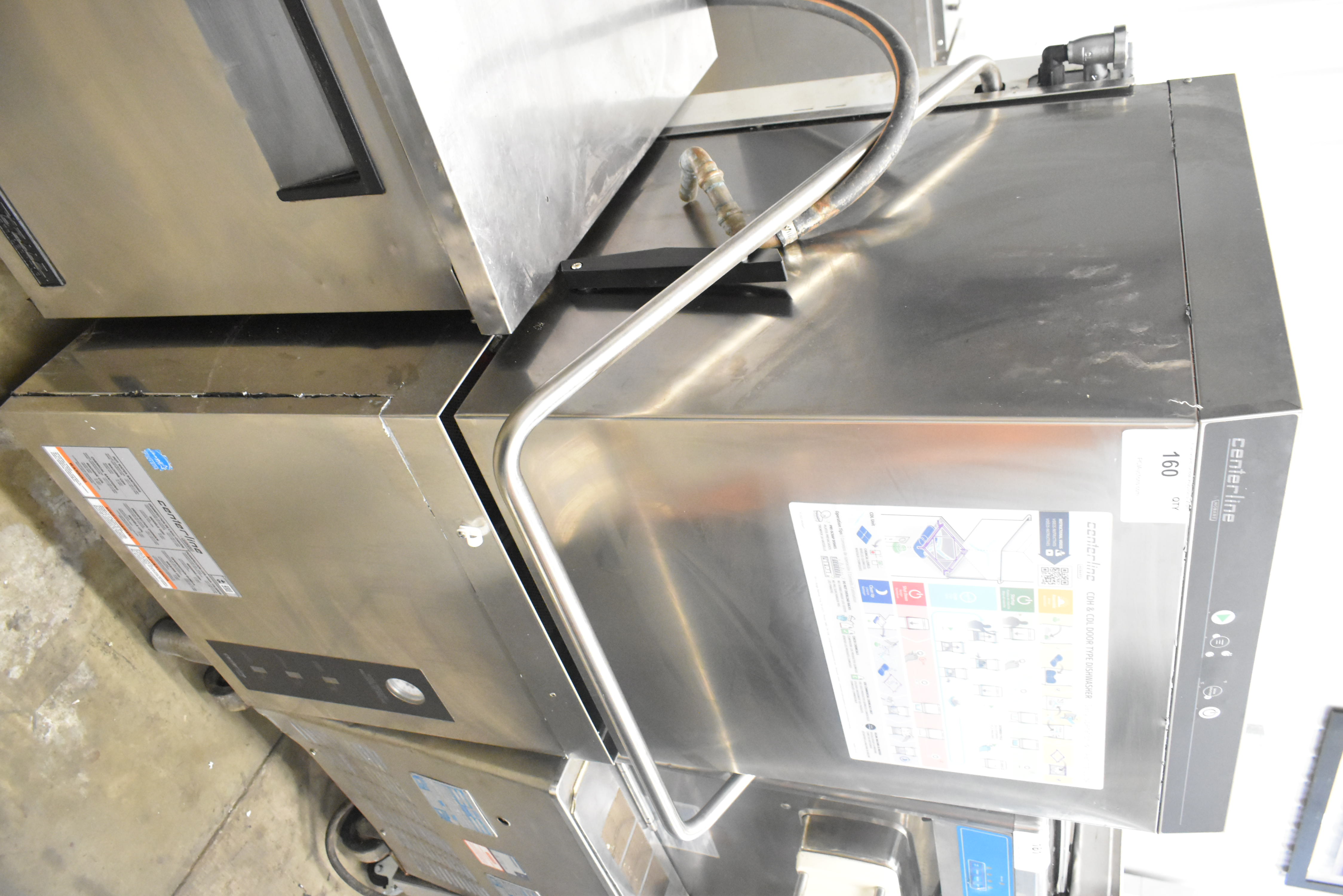 Undercounter dishwasher next to undercounter refrigeration unit showing relative size comparison