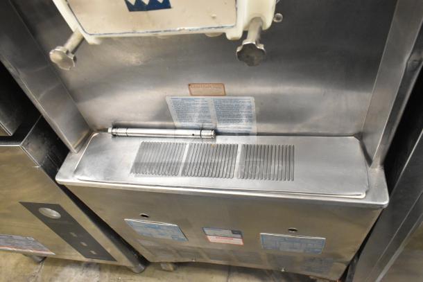 Taylor 754-27 stainless steel commercial soft serve ice cream machine. Two flavors with twist option. 208-230V, 1 phase.
