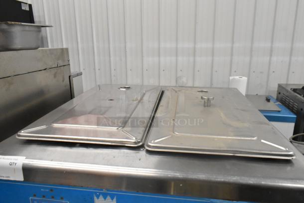Taylor 754-27 stainless steel soft serve machine, 2 flavor with twist, 208-230V, shown with stainless lids.