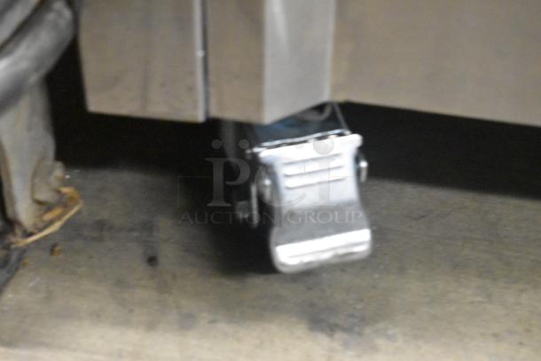 D425 stainless steel soft serve ice cream machine caster wheel, part of commercial floor model, 115V, 1 Phase.